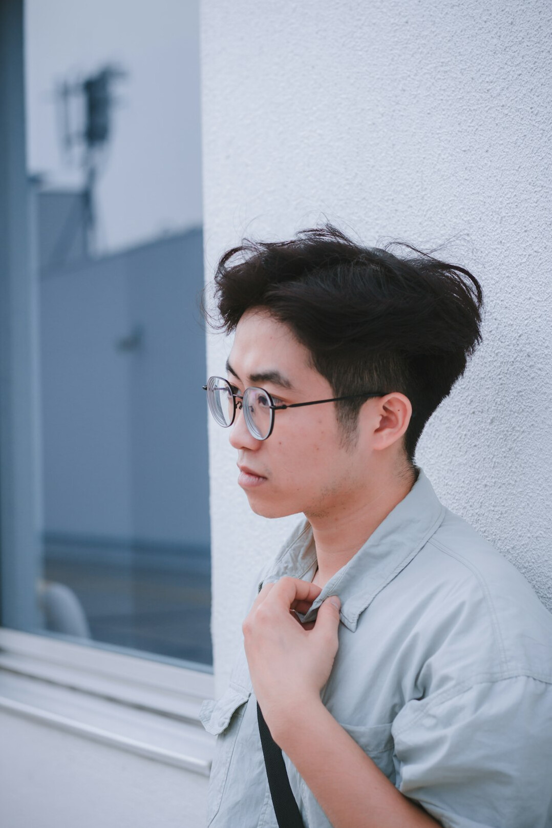 Portrait of a man with glasses and greying hair