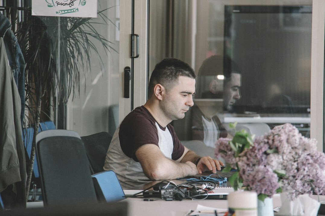 beginner programmer at desk