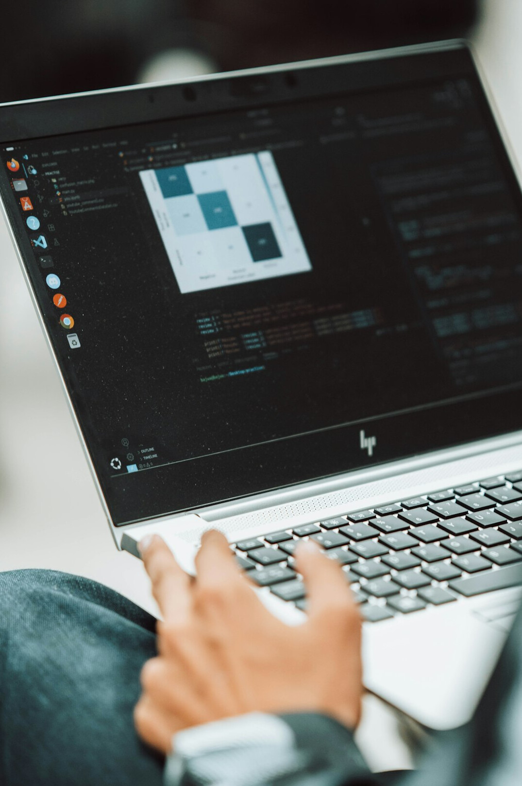 person learning coding on laptop
